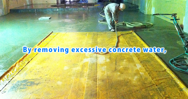 By removing excessive concrete water,